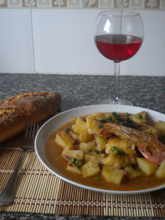Una foto de Suquet de merluza y gambas