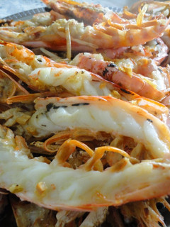 Una foto de Langostinos al whisky