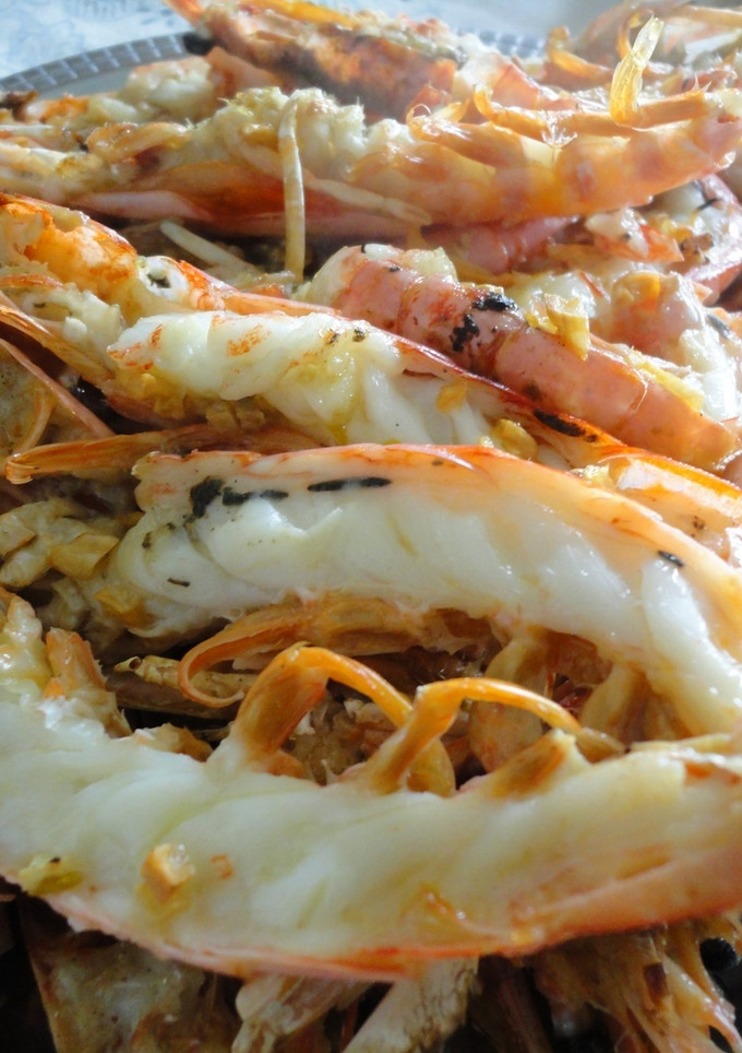 Una foto de Langostinos al whisky