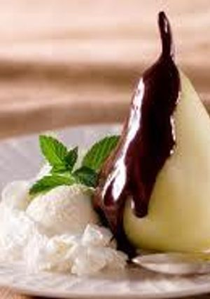 Una foto de Peras a la salsa de chocolate