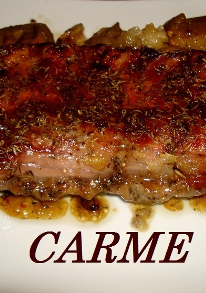 Una foto de Costillar de cerdo a la miel con manzanas