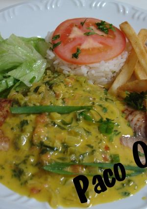 Una foto de Tilapia ao molho de coco