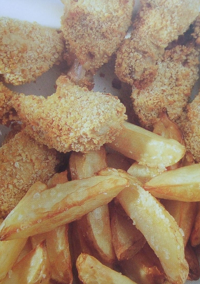 Una foto de Pollo estilo americano con patatas asadas