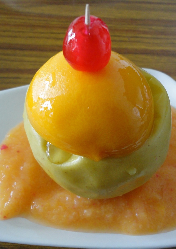 Una foto de Manzanas asadas con sombrero