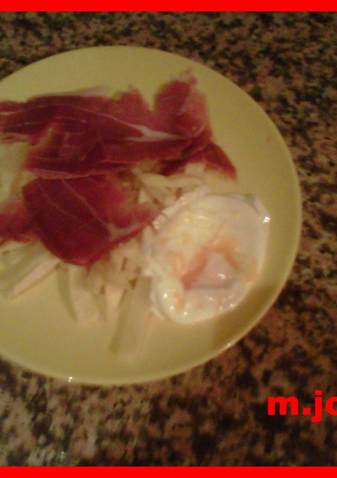 Una foto de Huevos con patatas y jamón