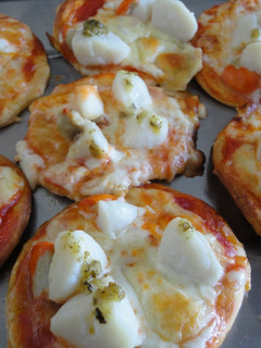 Una foto de Mini pizzas de vieiras