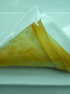 Una foto de Triángulos de espinacas y queso