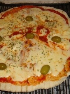 Una foto de PIZZA A LA PARRILLA 