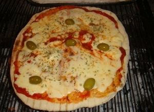Una foto de PIZZA A LA PARRILLA 
