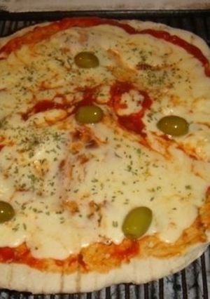 Una foto de PIZZA A LA PARRILLA 