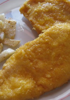 Una foto de Filetes de pollo empanados con gusanitos
