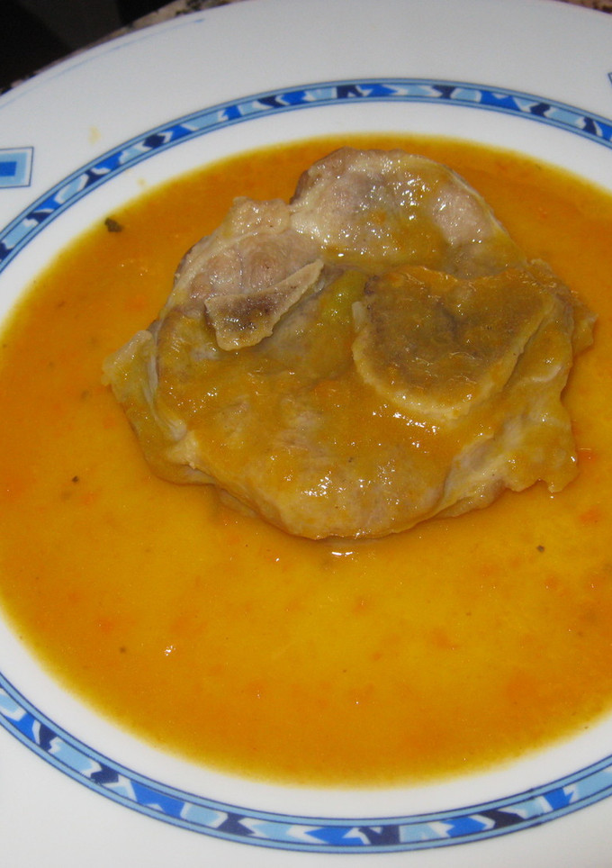 Una foto de Ossobuco de cerdo estofado