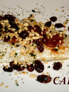 Una foto de Bacalao al horno con frutos secos