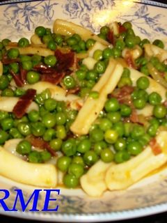 Una foto de Guisantes estofados con calamares