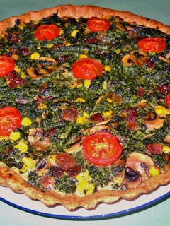Una foto de Quiche de espinacas, champiñones y maíz