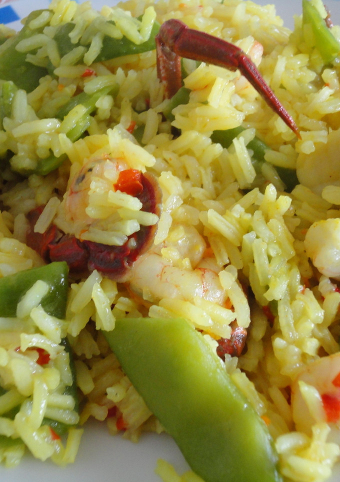 Una foto de Arroz de nécoras y vieiras