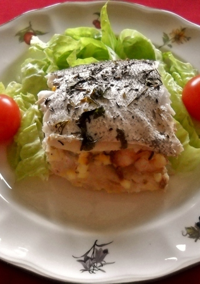 Una foto de Pescadilla rellena de gambas y anchoas