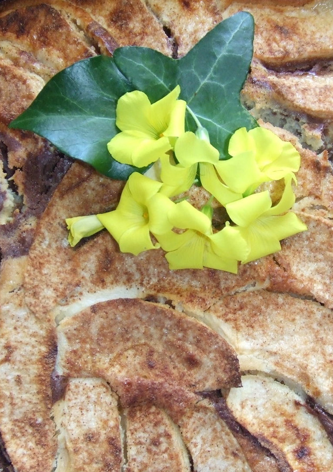 Una foto de Tarta marmolada con manzanas amarillas