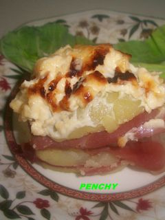 Una foto de Lasaña de jamón ibérico y patatas gratinadas