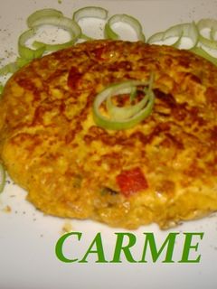 Una foto de Tortilla de paella