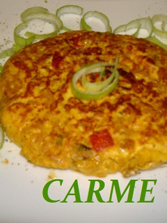 Una foto de Tortilla de paella