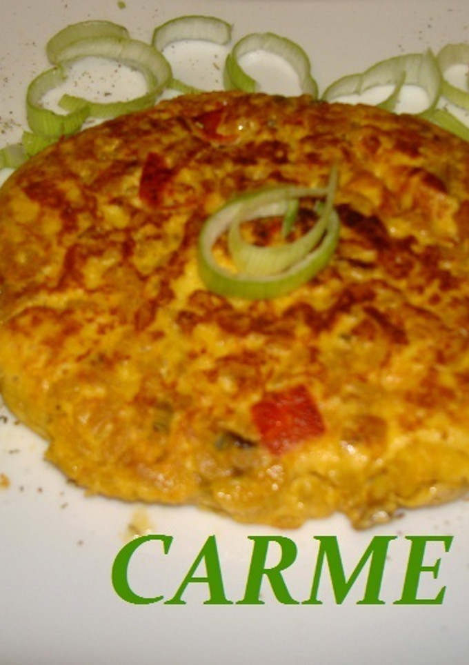 Una foto de Tortilla de paella