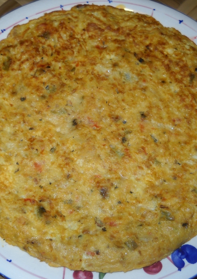 Una foto de Ropa vieja al estilo de mi madre en tortilla