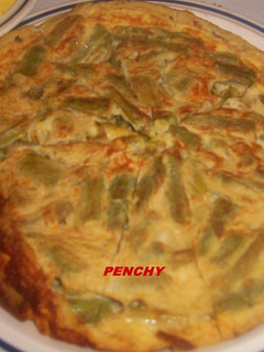 Una foto de Tortilla de judias verdes con jamón iberico