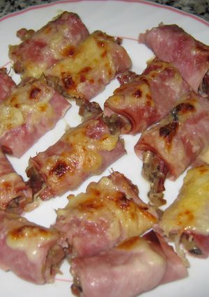 Una foto de Rollitos de jamón gratinados