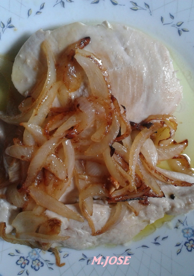 Una foto de Pechugas encebolladas