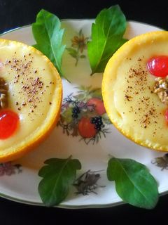 Una foto de Naranjas rellenas con crema de queso