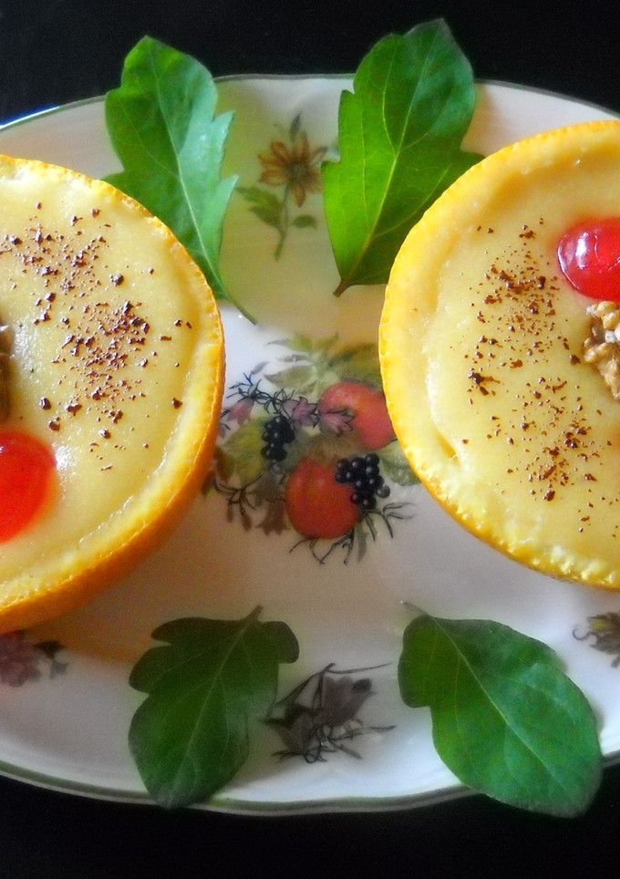 Una foto de Naranjas rellenas con crema de queso
