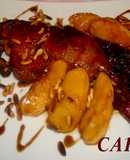 Pato asado con piñones y manzanas caramelizados