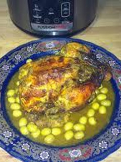 Una foto de Pollo al horno estilo marroqui