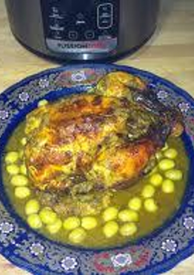 Una foto de Pollo al horno estilo marroqui