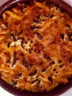 Una foto de Macarrones gratinados al pesto
