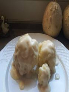 Una foto de Coliflor al vapor con bechamel