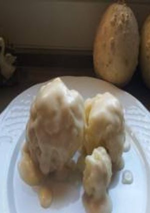 Una foto de Coliflor al vapor con bechamel