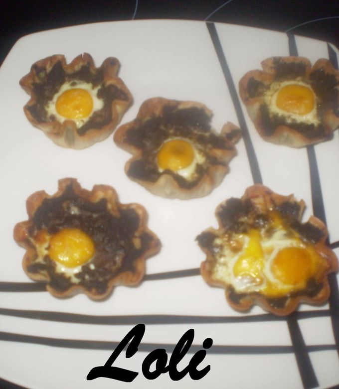 Foto principal de Cestitas de morcilla con huevo de codorniz