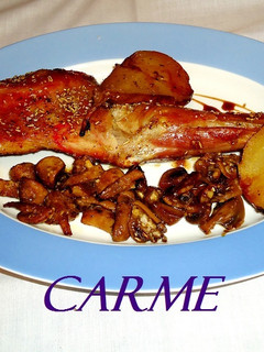 Una foto de Paletilla de cabrito al horno con peras