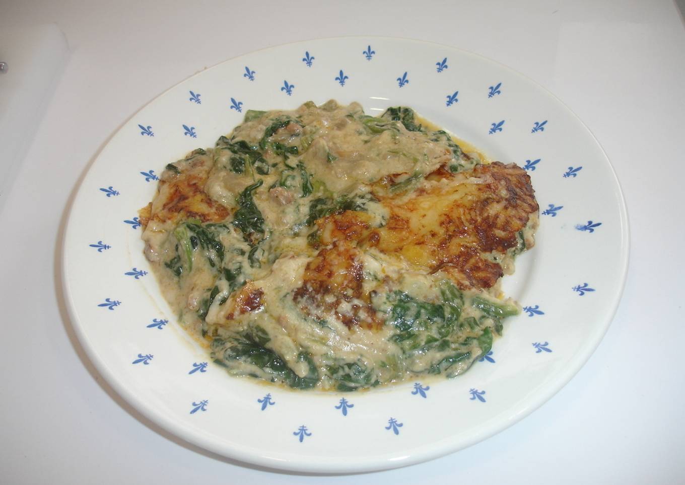 Espinacas con bechamel y nueces