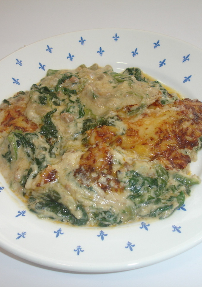 Una foto de Espinacas con bechamel y nueces