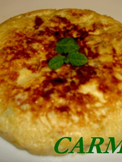 Una foto de Tortilla de calabacín, manzana y jamón ibérico