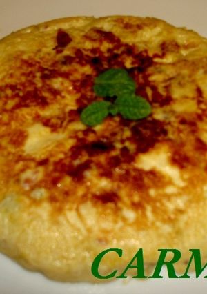 Una foto de Tortilla de calabacín, manzana y jamón ibérico