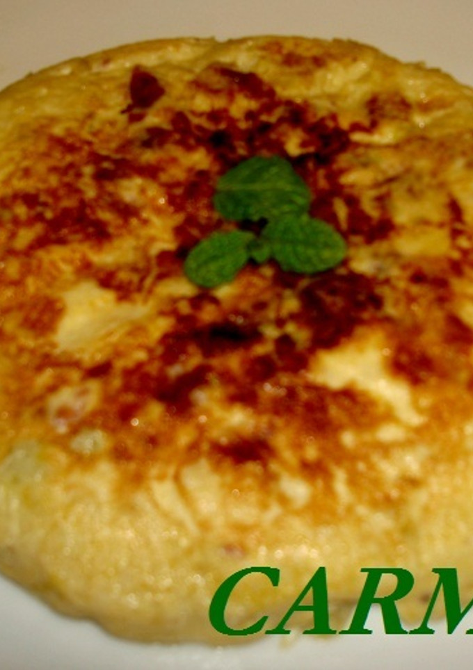 Una foto de Tortilla de calabacín, manzana y jamón ibérico