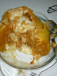 Una foto de Calabaza rellena con restos de risotto de arroz