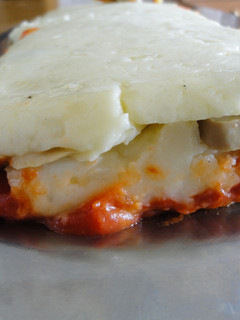 Una foto de Pastel de patatas y champiñones