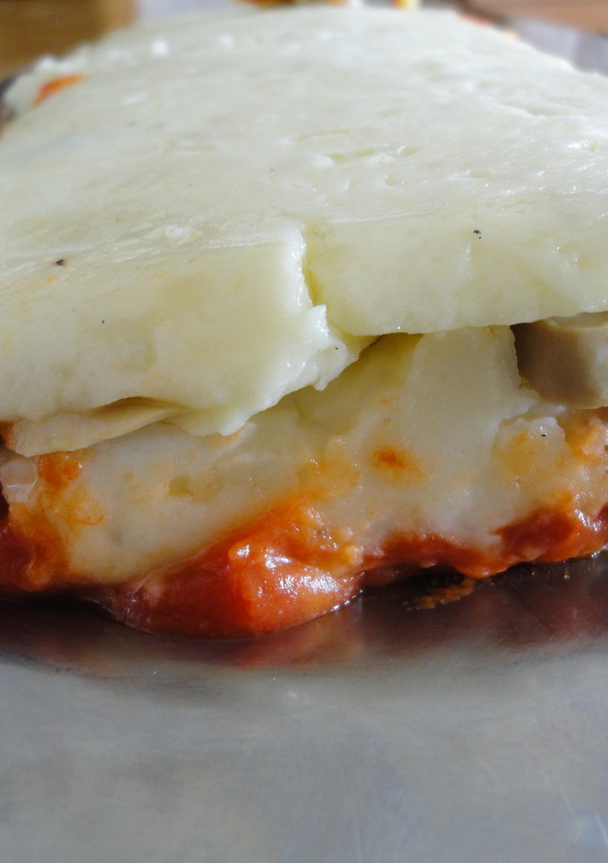 Una foto de Pastel de patatas y champiñones