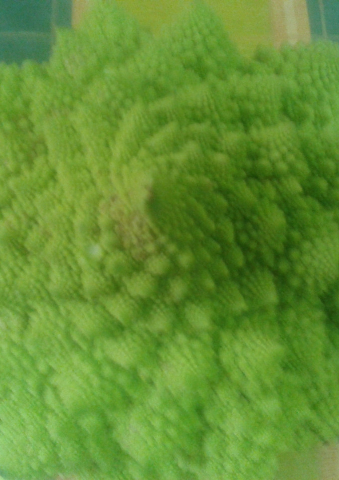 Una foto de Romanesco al ajo frito