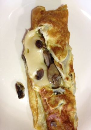 Una foto de Tortilla de champiñones y queso